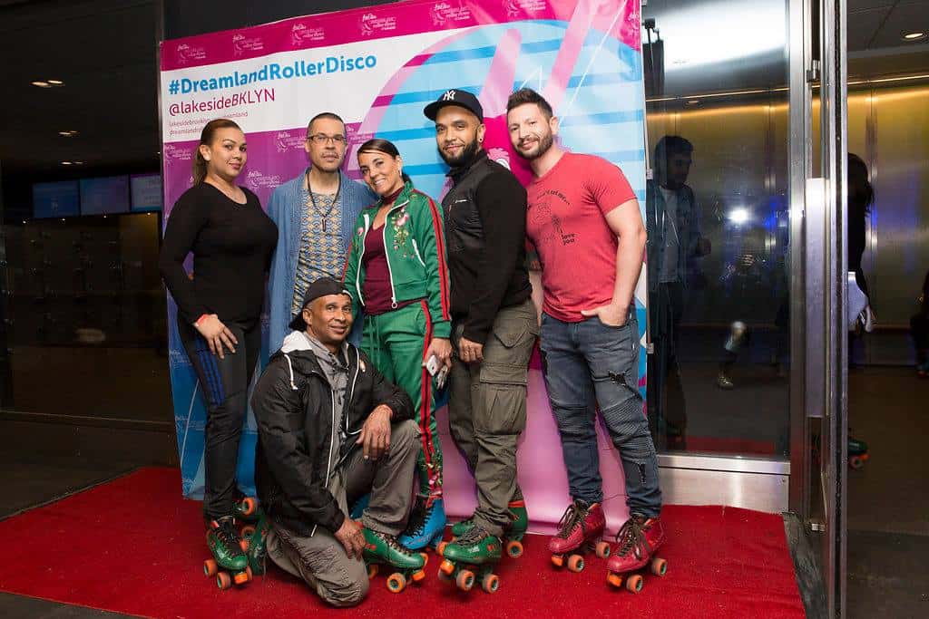 a group of people posing for the camera