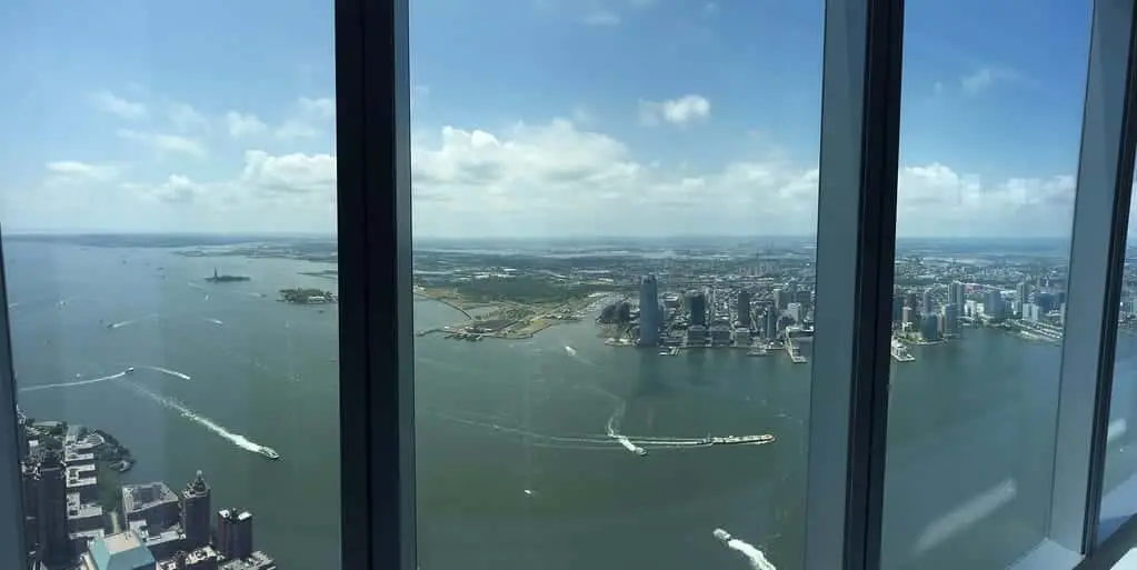 a view of a large body of water with a city in the background