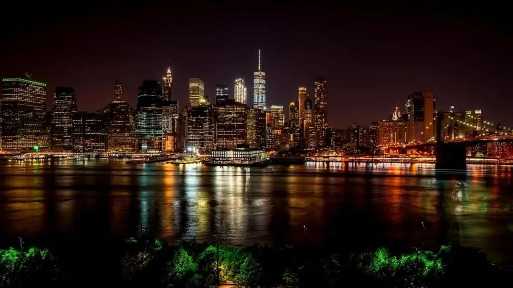 a view of a large body of water with a city in the background