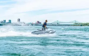 a man riding a jet ski in the water