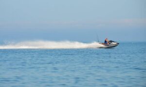 jet ski speeding across the water in NY