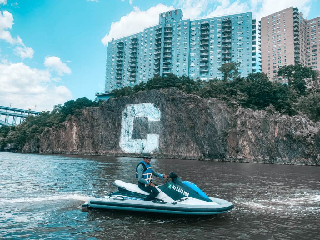 man on a jet ski in front of The Columbia C