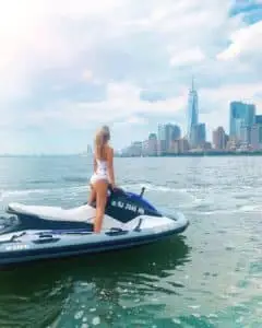 Girl standing on Jet Ski
