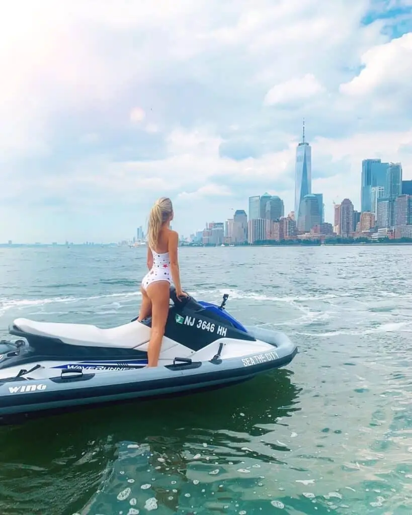 Girl standing on Jet Ski