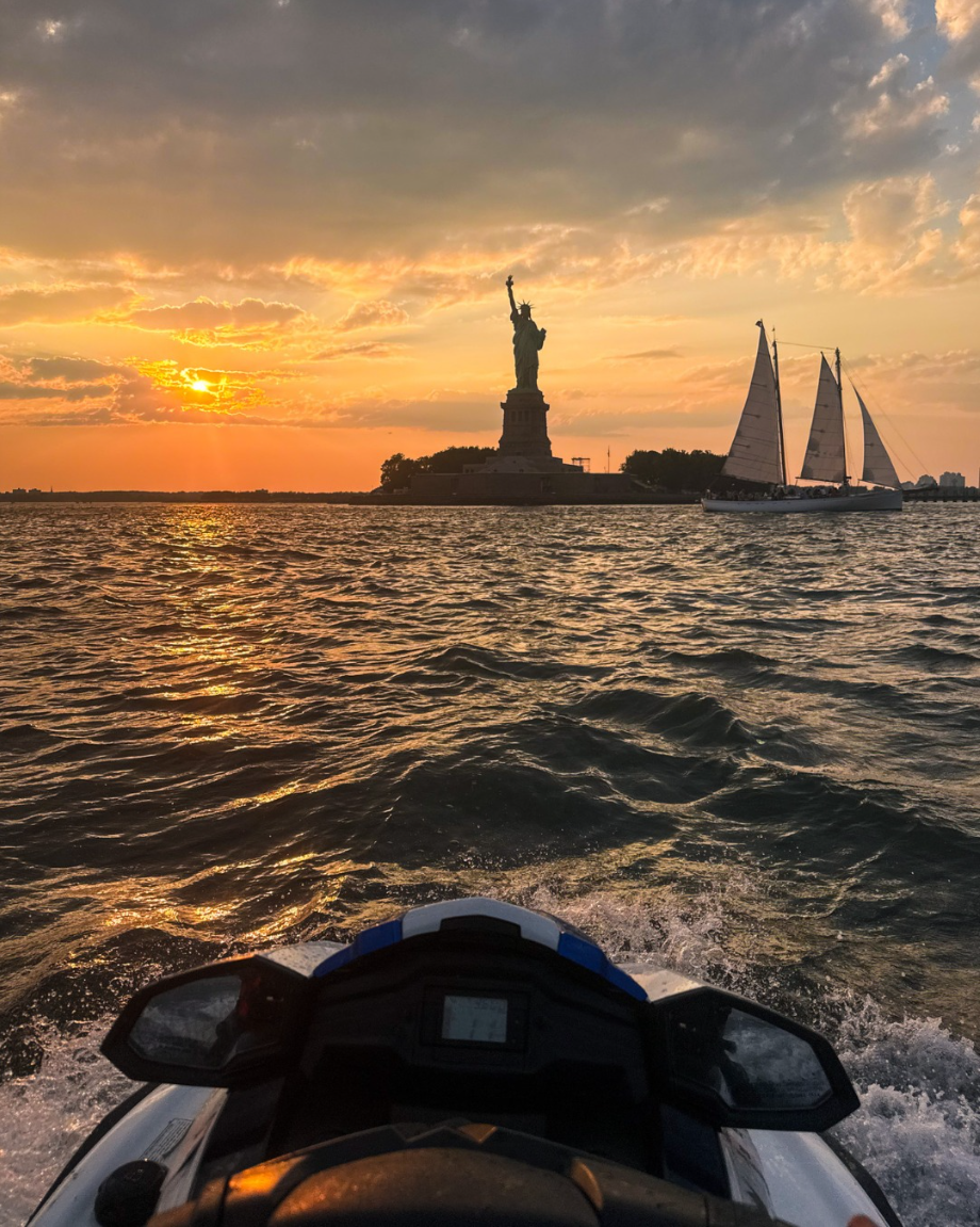 Jet ski in front of the Statue of Liberty