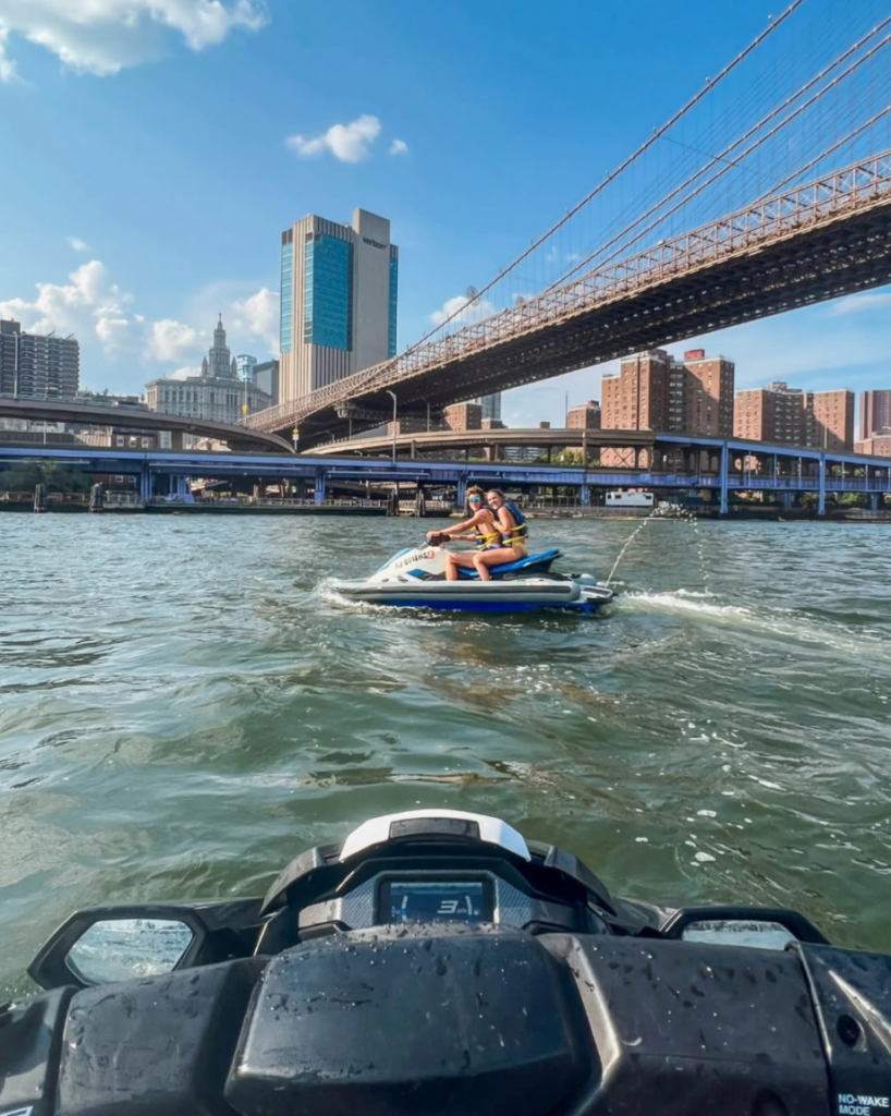 jet skiing by the brooklyn bridge