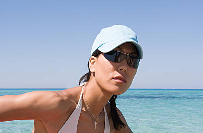 girl wearing sunglasses on jet ski