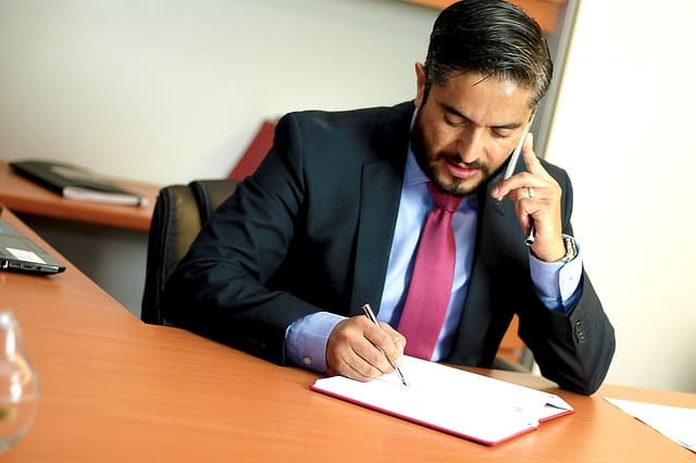 a man sitting at a desk