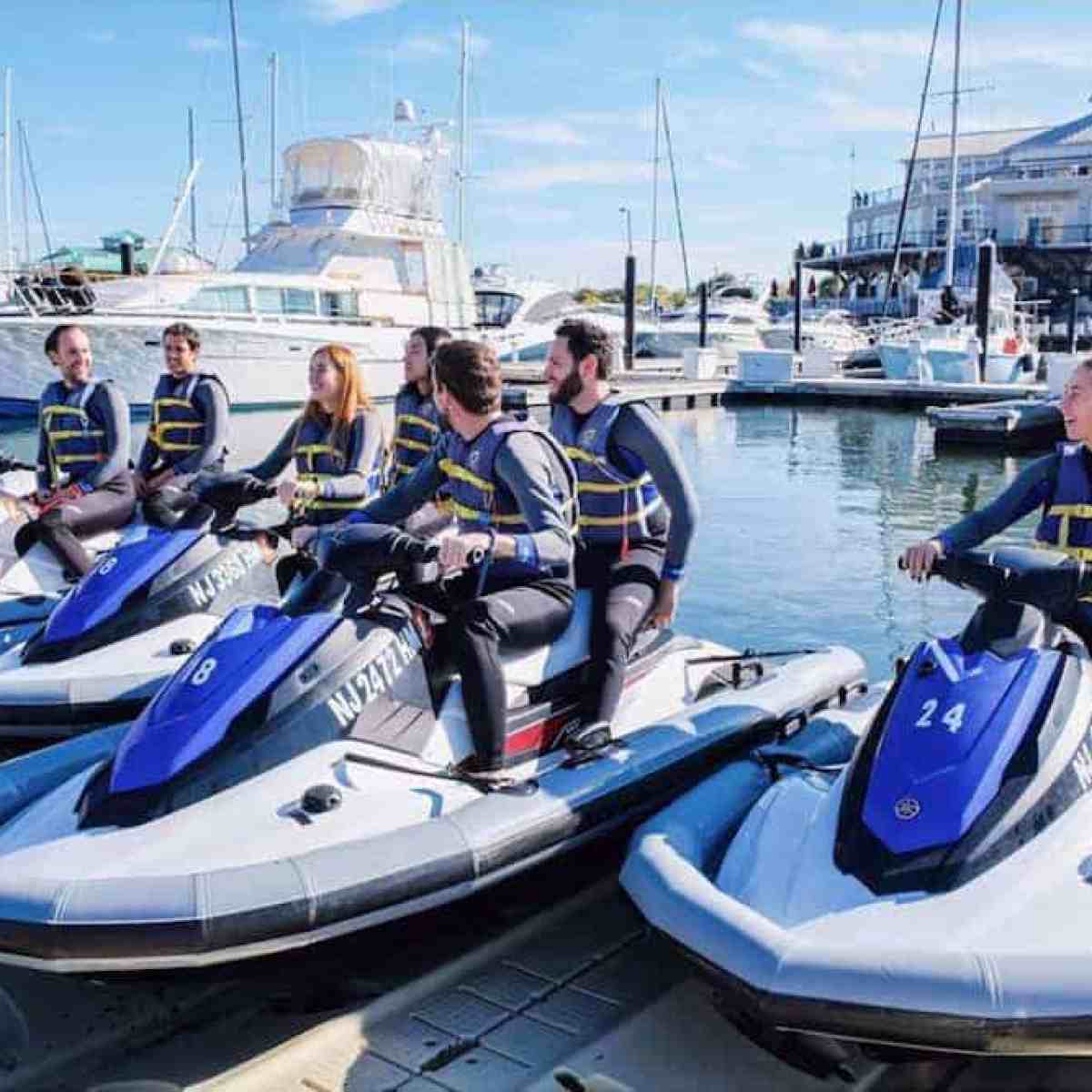 birthday party group on jet skis in the water