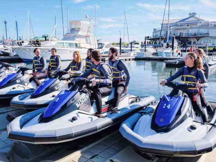 birthday party group on jet skis in the water
