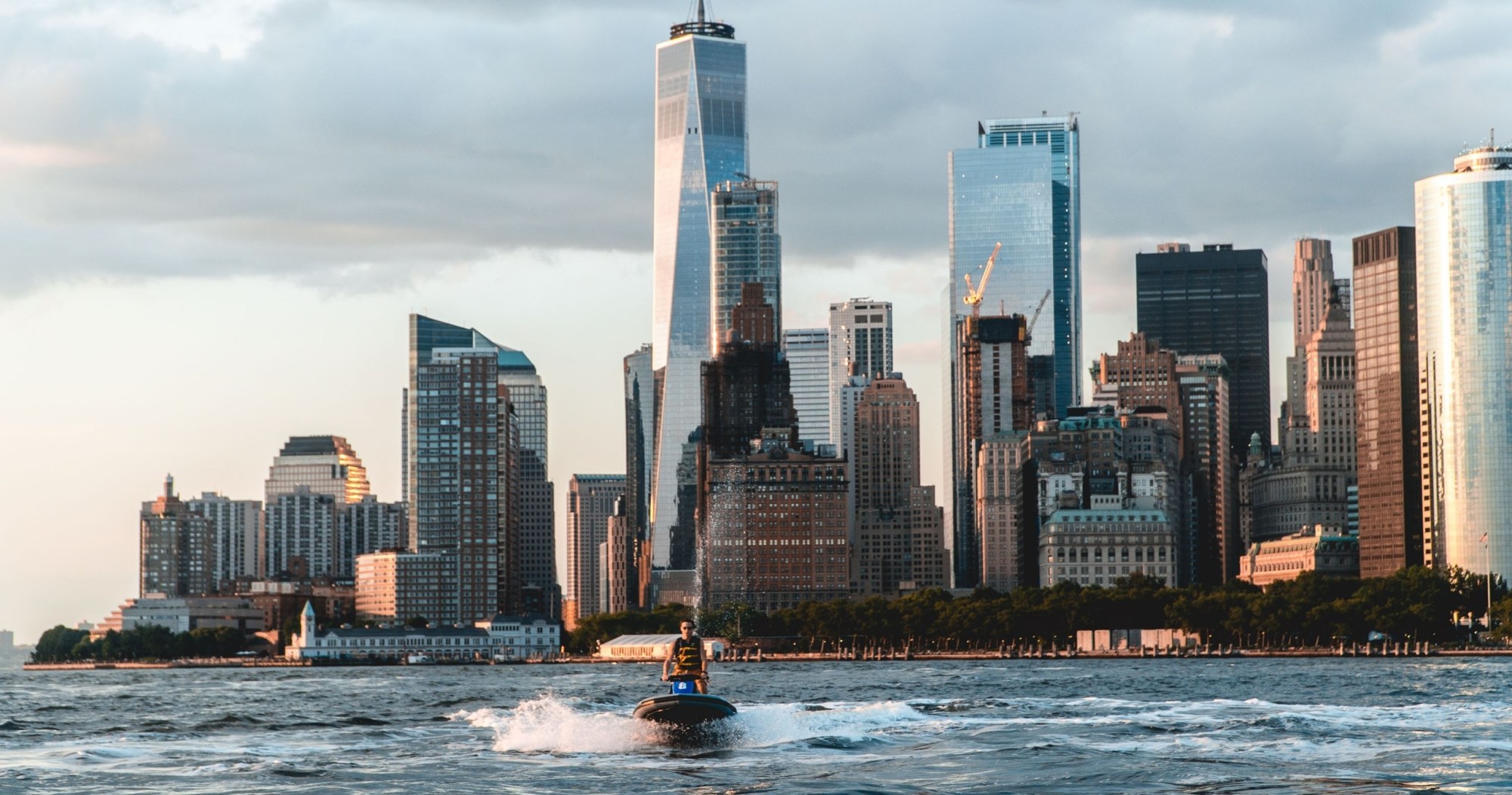 jet skiing in front of the world trade center in NYC jet skiing in front of the world trade center in NYC