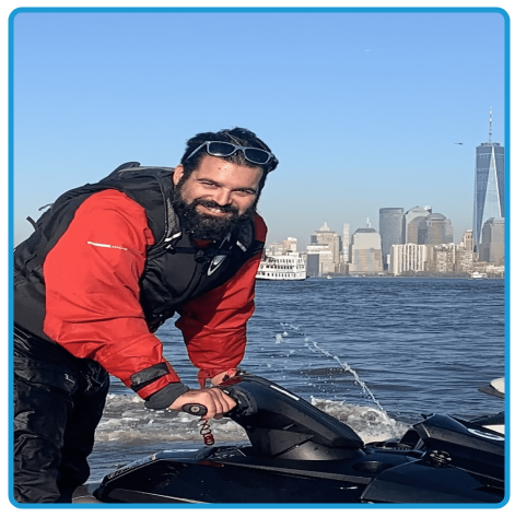 a man riding on the back of a boat