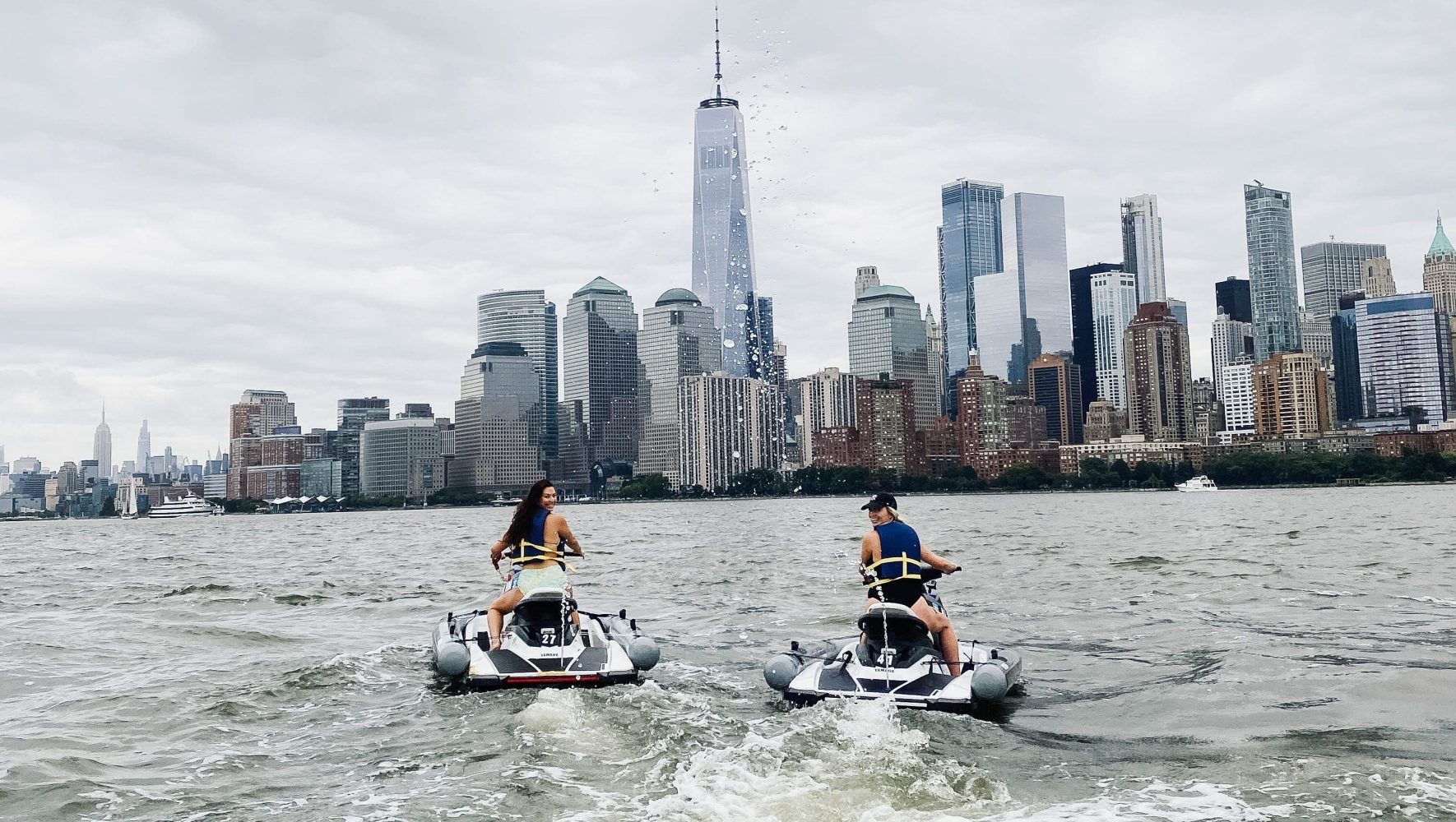 a group of people riding on the back of a boat