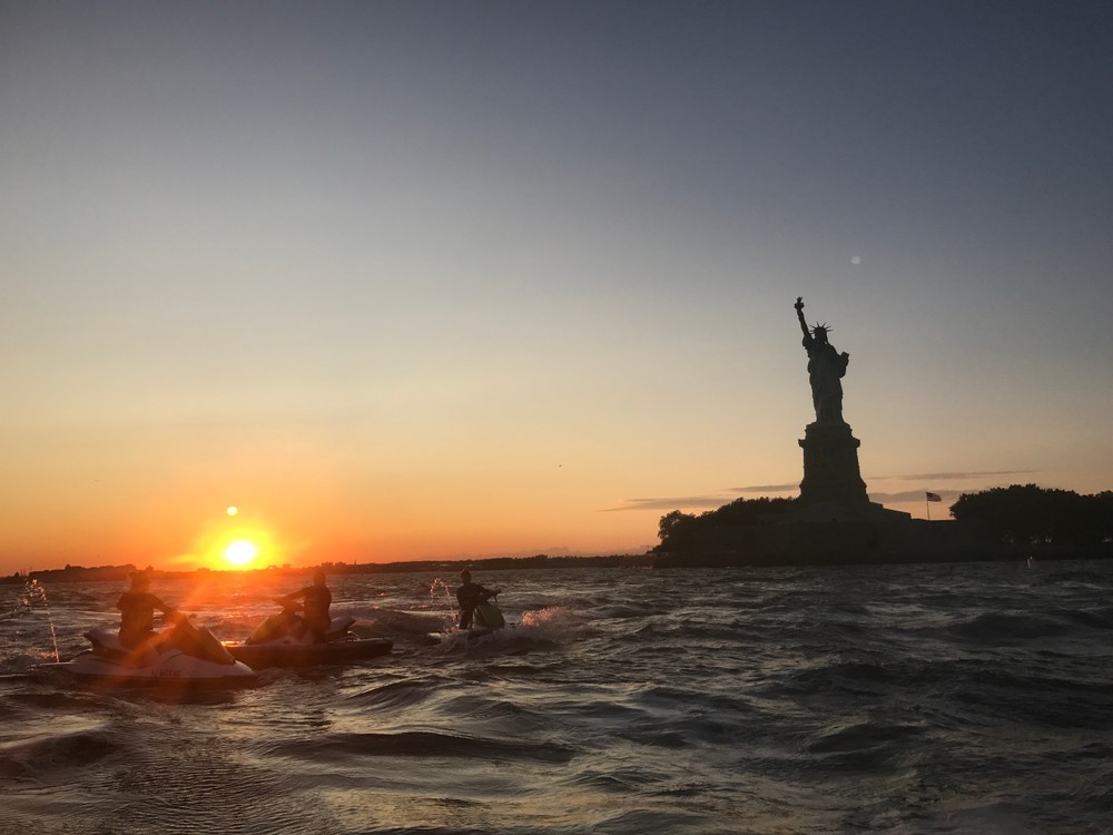 a sunset over a body of water