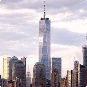 a large body of water with a city in the background
