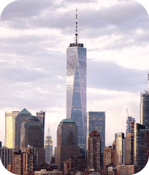a large body of water with a city in the background