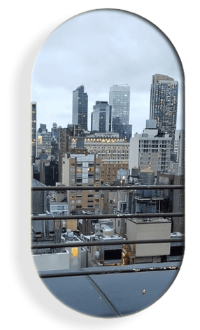 a large body of water with a city in the background